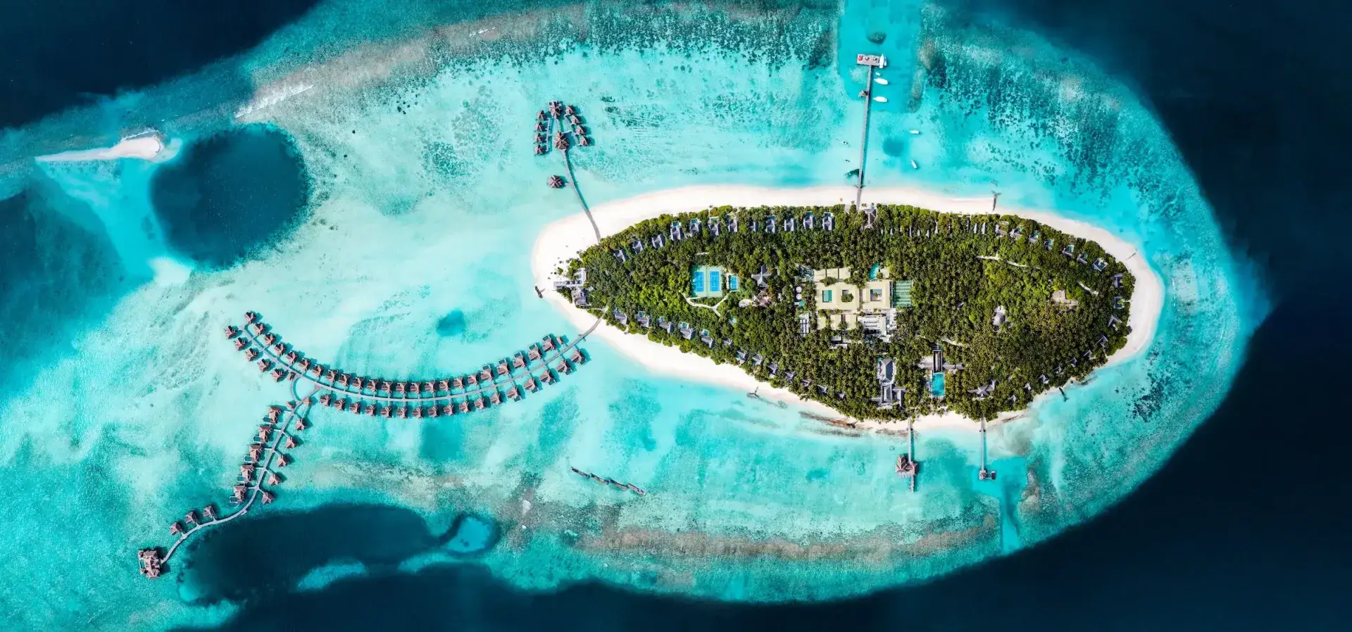 Aerial view of Vakkaru Maldives and its water villas